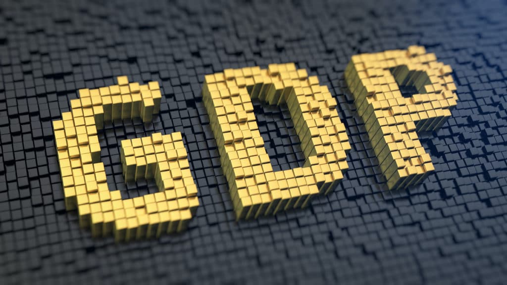Gross domestic product (GDP) graphic concept with yellow square pixels on a black matrix background. (Photo: AdobeStock)