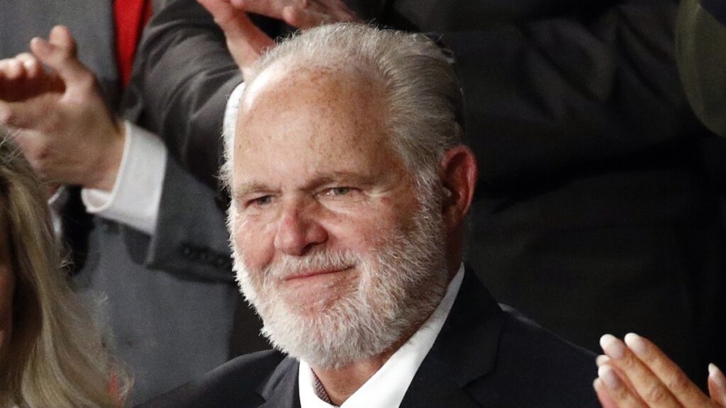 Rush Limbaugh stands for applause after receiving the Presidential Medal of Freedom from President Donald J. Trump during the State of the Union in January 2020.